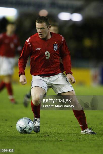Wayne Rooney of England runs with the ball during the International Friendly match between Sweden and England held on March 31, 2004 at Ullevi...