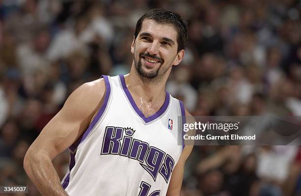 Predrag Stojakovic of the Sacramento Kings walks on the court during the game against the New Orleans Hornets at Arco Arena on April 6, 2004 in...