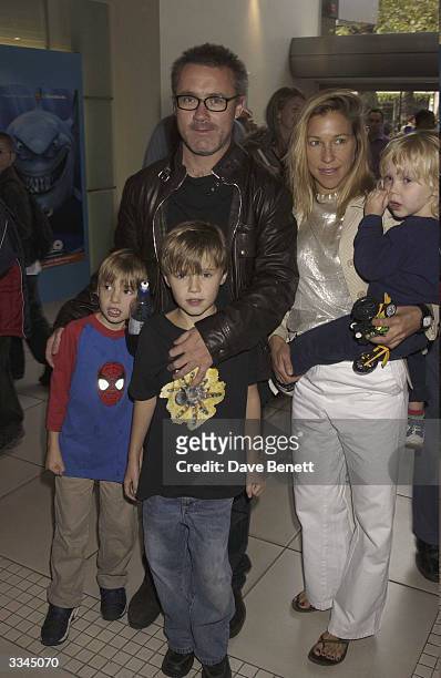 Damien Hirst and family attend the UK Premiere of 'Finding Nemo" at The Odeon, Leicester Square on September 28, 2003 in London.