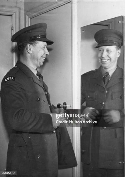 British entertainer George Formby in his ENSA uniform.