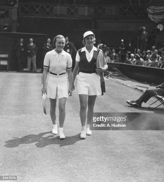 Miss S Piercey and Alice Marble walking on to the centre court for a second round match in the Women's Singles at Wimbledon.