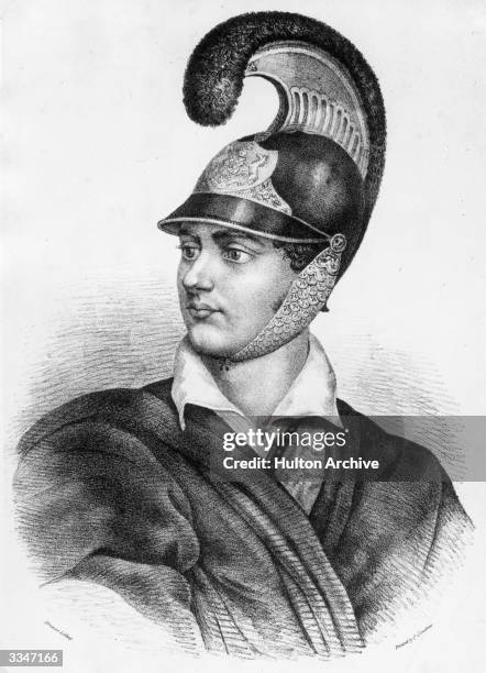 English poet and writer George Gordon Noel Byron, 6th Baron Byron, wearing his Grecian helmet, which is now kept at Newstead Abbey, Nottingham.