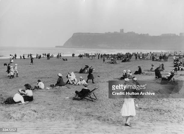 Holidaymakers on the North Beach at Scarborough, North Yorkshire.