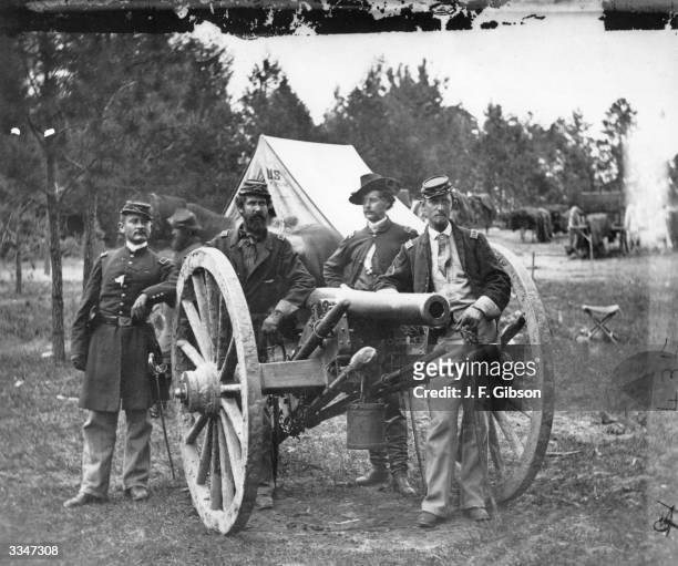 Captain John T Tidball of the Union Army poses with his staff at Fair Oakes, Virginia, during the American Civil War.
