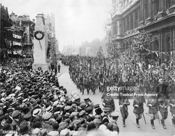 British soldiers passing the Cenotaph as they parade in the London Peace Pageant after WW I.