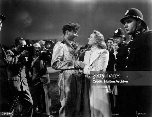 Robert Newton and Anna Neagle starring in 'They Flew Alone' based on the life story of aviation pioneer Amy Johnson.