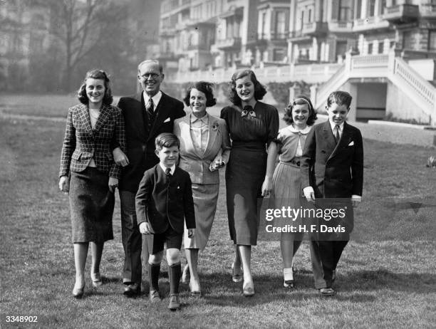 Joseph Patrick Kennedy , the American Ambassador and financier with his wife and five of their nine children at the Princes Gate home in London. Left...