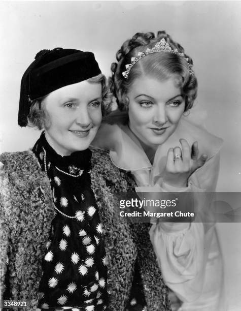 Actress Myrna Loy, chosen to play the role of Billie Burke in 'The Great Ziegfeld', with the real life Billie Burke , actress and widow of the famous...