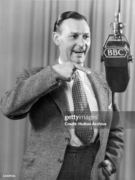 Al Rae Comedian English comedian Al Read at a microphone during a BBC Radio broadcast ...