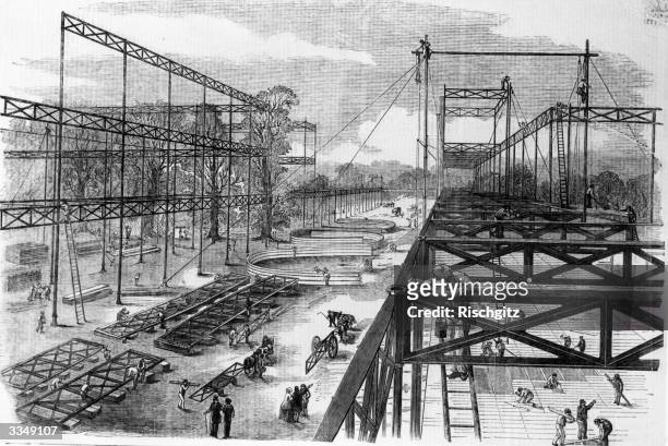 The construction of Crystal Palace in Hyde Park, for the Great Exhibition of 1851. After the exhibition, the prefabricated building was relocated in...