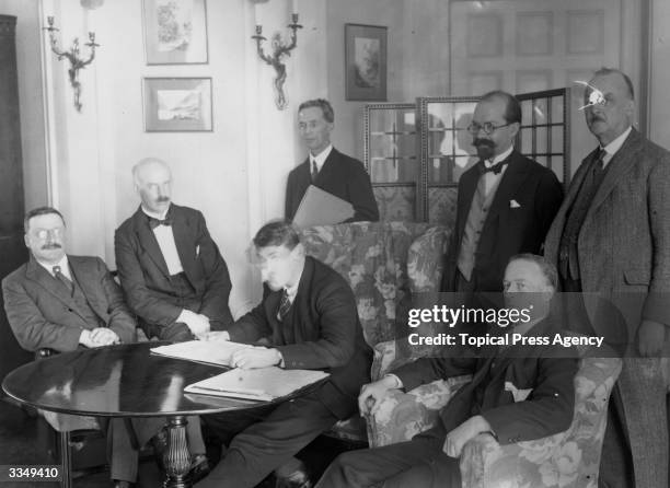 View of members of the Irish delegation at the signing of the Irish Free State Treaty between Great Britain and Ireland, London, England, December 6,...