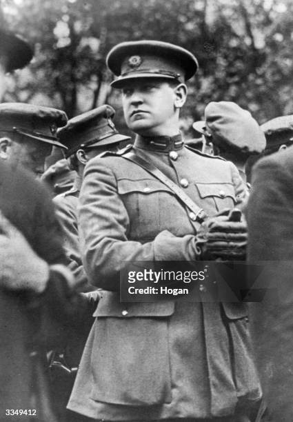 Irish soldier and nationalist politician Michael Collins , in the uniform of the Irish Free State, at the funeral of Arthur Griffith, the first...