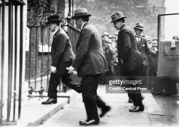 Irish soldier and Minister for Defence Michael Collins and Irish nationalist leader Arthur Griffith arriving at 10 Downing Street, London for the...