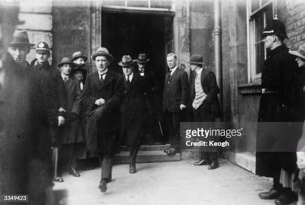 Irish politician and Sinn Fein leader Michael Collins and Kevin O'Higgins arriving at Dublin Castle for the formal transfer of power before the Irish...