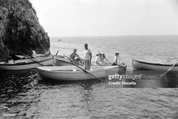Sight-seeing boats queue up for entry to the Isle of Capri's famous 'Grotta Azzurra' or Blue Grotto.