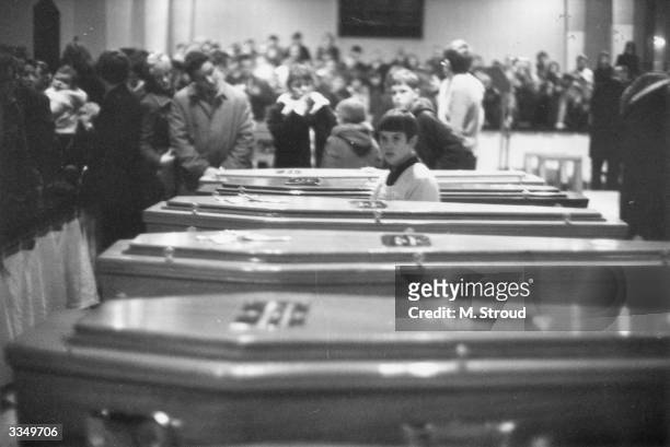 Coffins of the 13 civilians shot dead by British Paratroopers on Bloody Sunday lined up for the funeral at St Mary's church in Derry City.