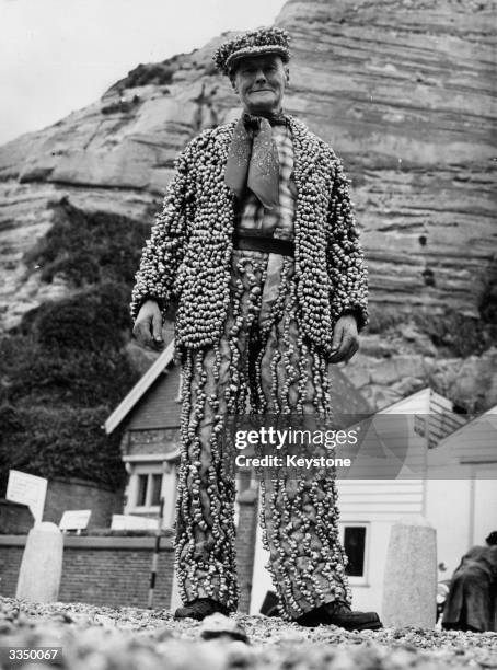 Slogger Hoad, the Winkle King of Hastings, often to be seen in his winkle suit which took six months to make, using 9626 winkle shells.