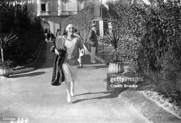 French tennis player Suzanne Lenglen arriving to compete in the Carlton Tennis Tournament on the French Riviera.