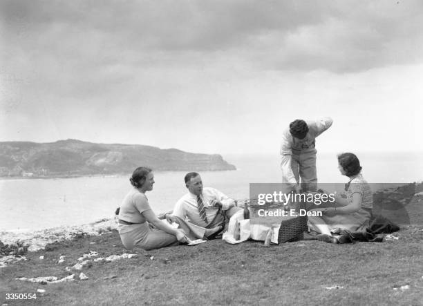 Picnic party on the 'Little Orme' at Llandudno, Wales.