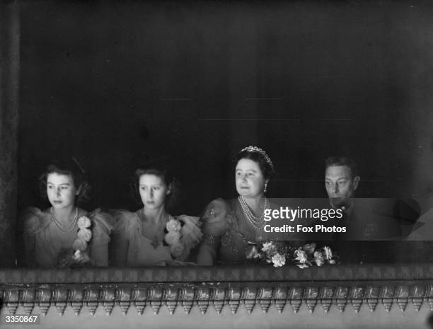 King George VI and Queen Elizabeth , accompanied by the two Princesses, in the royal box for the re-opening of the Royal Opera House, Covent Garden,...