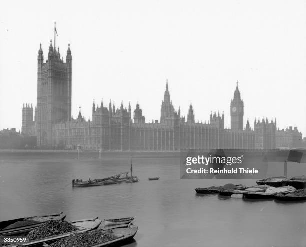The Houses of Parliament in London, the seat of the British legislature. Built from plans by Sir Charles Barry between 1840 and 1860 in a late gothic...