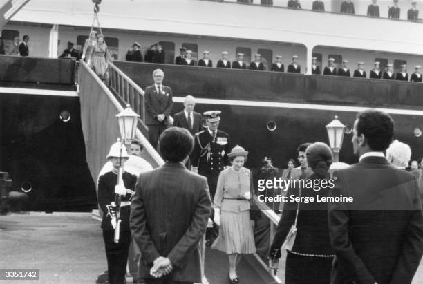 Queen Elizabeth II arrives in Algeria for a state visit, and disembarks from the royal yacht 'Britannia', accompanied by her husband Prince Philip...