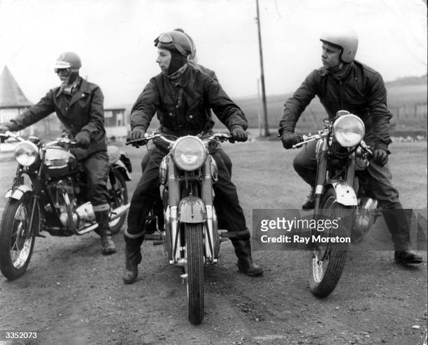 Gang of bikers prepare to set off along the road.