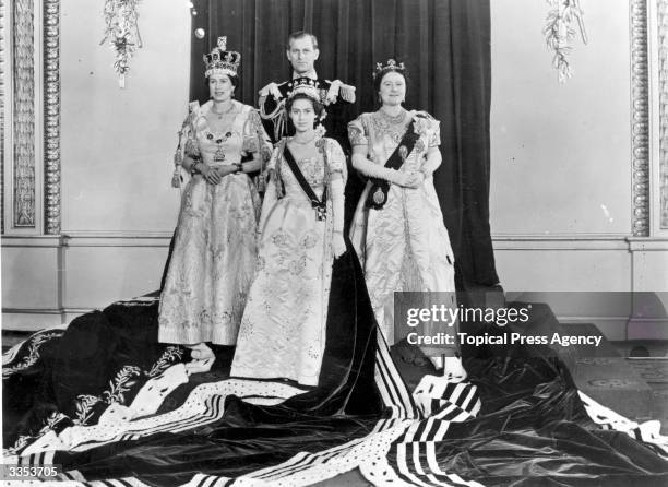 Queen Elizabeth II with Philip, Duke of Edinburgh, Princess Margaret Rose and Queen Elizabeth The Queen Mother wearing full Coronation regalia in the...