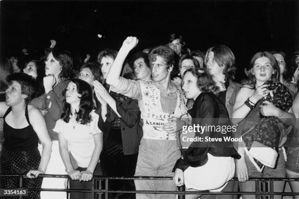 Fans of pop singer David Bowie at the last concert he performed in his Ziggy Stardust persona, at the Hammersmith Odeon, London.