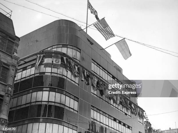 The Daily Express building in Fleet Street, London decked with flags of the Allies.