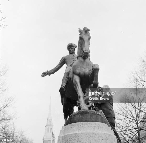The Mayor of Boston places a memorial wreath on the statue of Paul Revere, American silversmith, engraver and patriot, as part of Patriot Day...