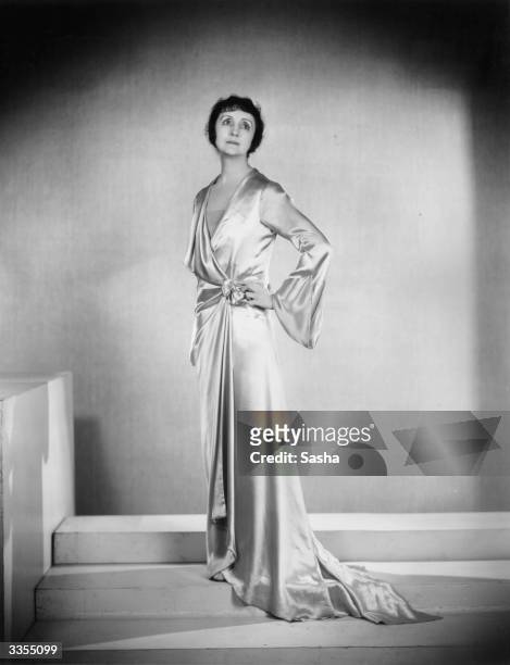 British actress Lilian Braithwaite in a gown that she wears in Ivor Novello's play 'Fresh Fields' at the Criterion Theatre, London.