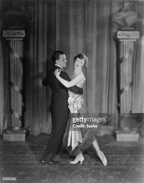 Dancers Diana Harris and Fred Trevor performing together.