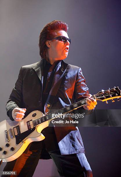 Andy Taylor of Duran Duran performs on stage during the first London date of their UK tour at Wembley Arena on April 13, 2004 in London. The original...