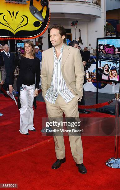 Actor David Duchovny attends the world premiere of the film "Connie and Carla" at the Universal Studios Cinema April 13, 2004 in Universal City,...