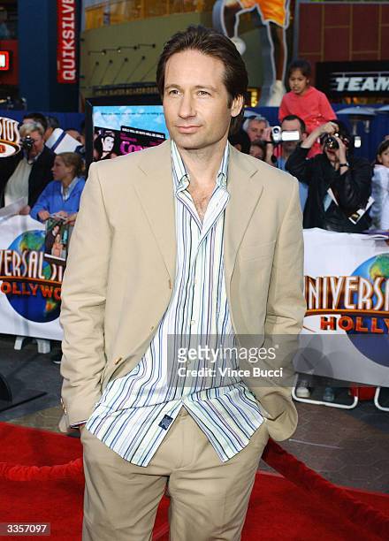 Actor David Duchovny attends the world premiere of the film "Connie and Carla" at the Universal Studios Cinema April 13, 2004 in Universal City,...
