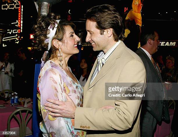 Actress Nia Vardalos and actor David Duchovny at the after party following the world premiere of her movie 'Carla and Connie' at the Hard Rock Cafe...