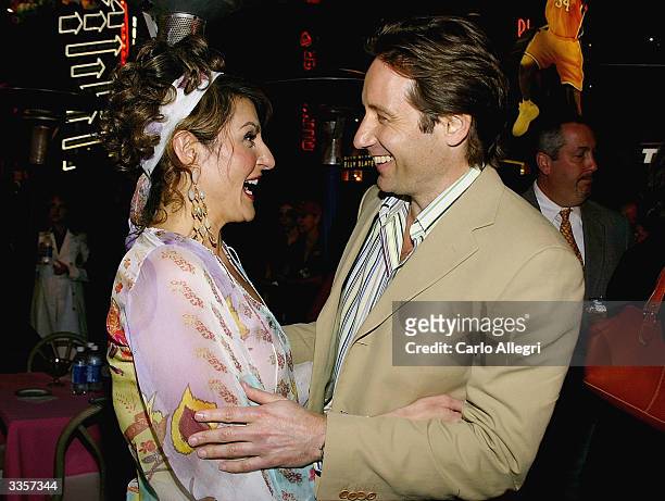 Actress Nia Vardalos and actor David Duchovny at the after party following the world premiere of her movie 'Carla and Connie' at the Hard Rock Cafe...