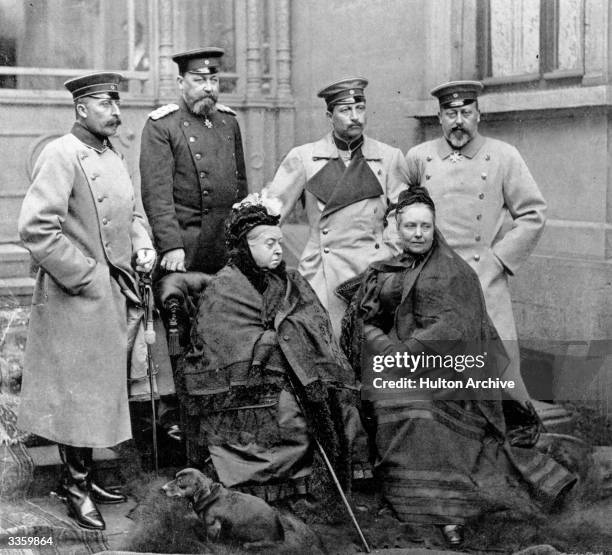 Royal group at Palais Edinburgh, Coburg. Back row, right to left: Prince of Wales, later Edward VII, Victoria's grandson, Wilhelm II Emperor of...