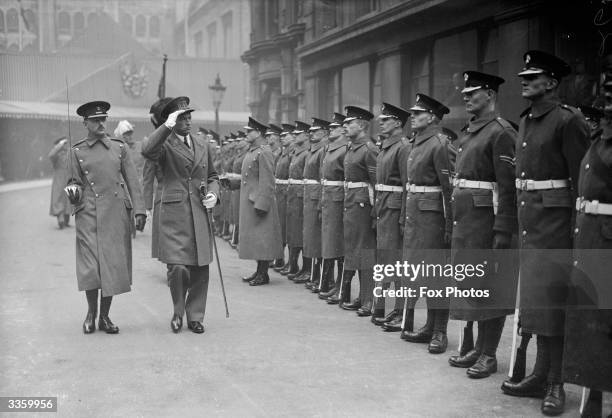 King Leopold III of Belgium inspects the guard of honour formed by the Honourable Artillery at Guildhall, London.