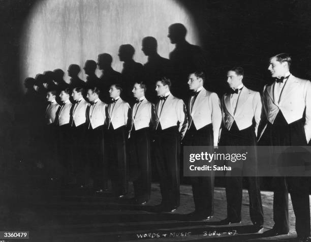 The chorus line from 'Words & Music', a revue by Noel Coward, at the Adelphi Theatre, London.