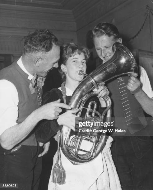 Austrians, Heinrich Hammerer, Paula Volgger and Karl Fetz of the Zillertal Singers and Dancers and the Vorarlberg Farmers Band in London for a...