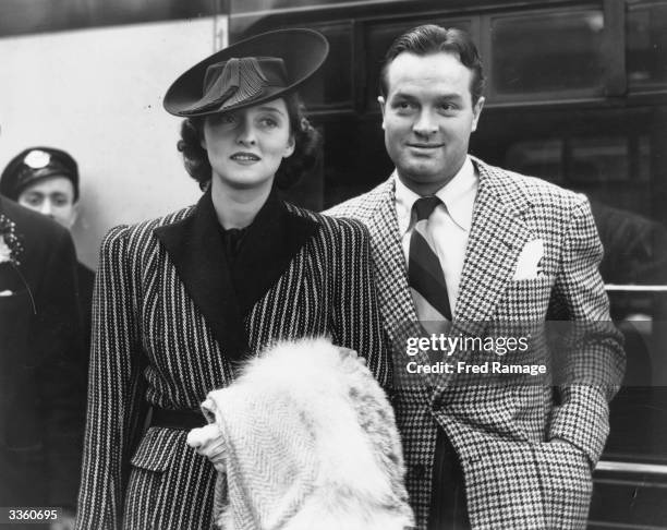 American comic and film actor Bob Hope and his wife Dolores arrive at London's Waterloo Station on the Normandie boat train.