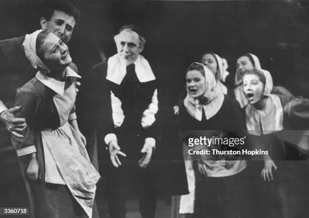 Scene from the Bristol Old Vic Company production of Arthur Miller's play 'The Crucible' in 1954 starring Abigail Williams, John Hale and John...