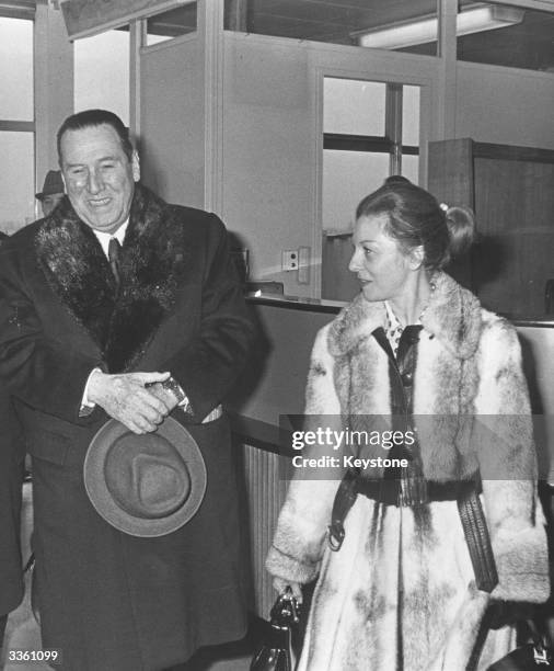 Argentinian president Juan Domingo Peron with his third wife Isabella Martinez at Paris airport.