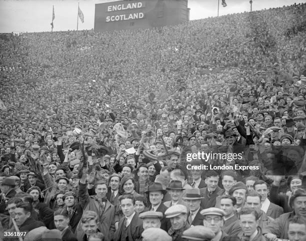 Section of the large crowd at an England versus Scotland football match. Matches between the two countries have always been a matter of great...