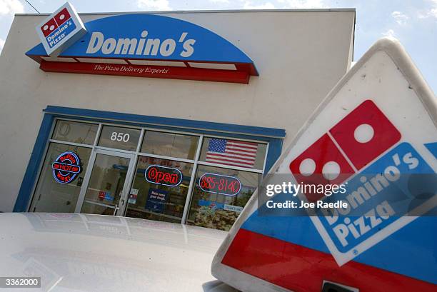 Domino's Pizza store April 14, 2004 in Miami, Florida. Domino's Pizza is looking to raise $300 million in the stock market by listing on the New York...