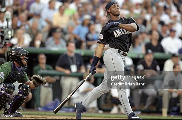 American League member Ken Griffey Jr. #24 of the Seattle Mariners watches after hitting the ball during the All-Star Home Run Derby at Coors Field...
