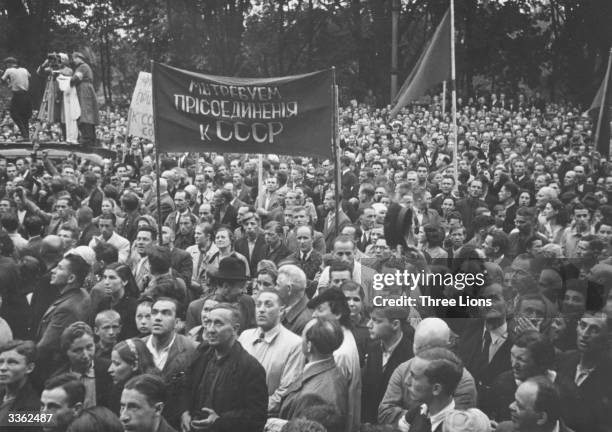 Crowds in Riga, the capital of Latvia, hailing the incorporation of the country into the Soviet Union.