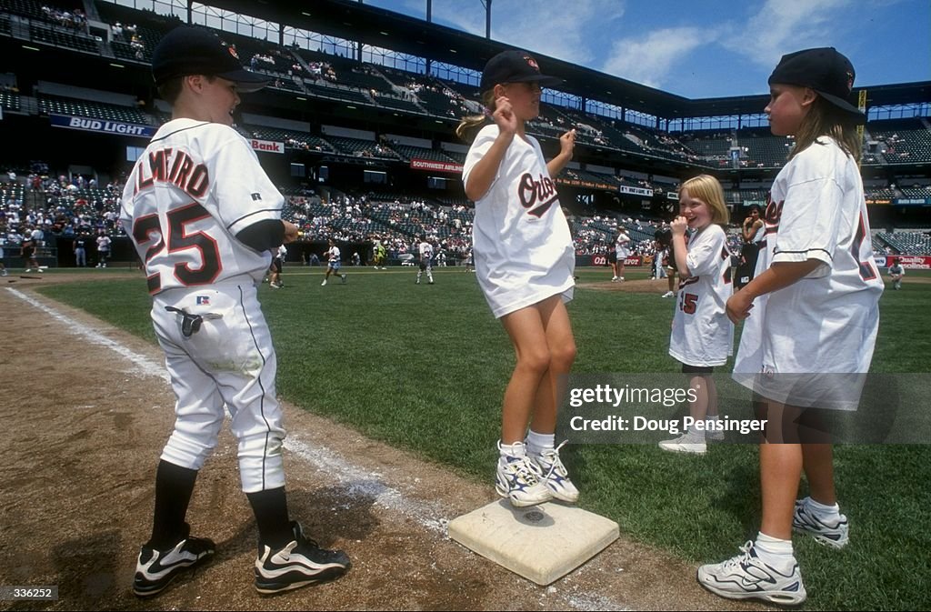 Rachel Ripken daughter of Cal Ripken of the Baltimore Orioles jumps